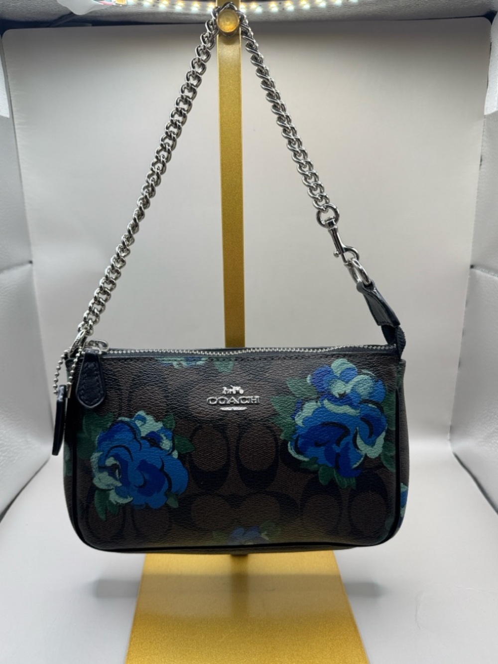 Coach Brown Signature Mini Bag with Blue Floral Print